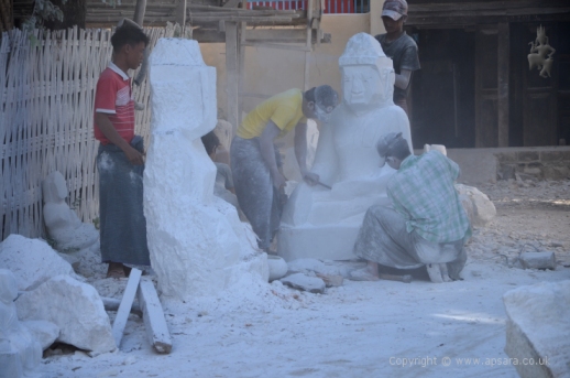 Carving Buddha statues from white marble at Sagyin ...
